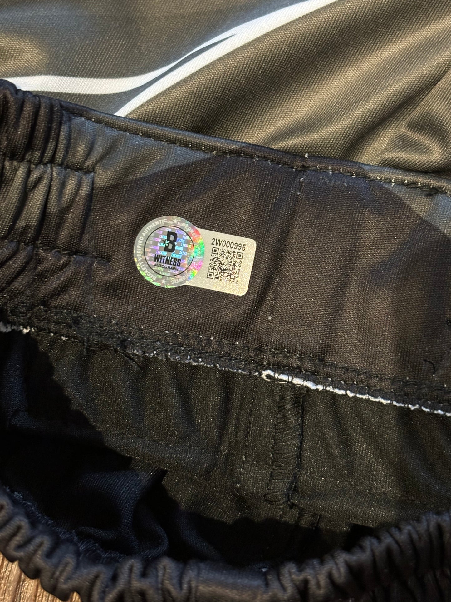 Derrick Lewis signed UFC Shorts Beckett certified QR Holographic Sticker