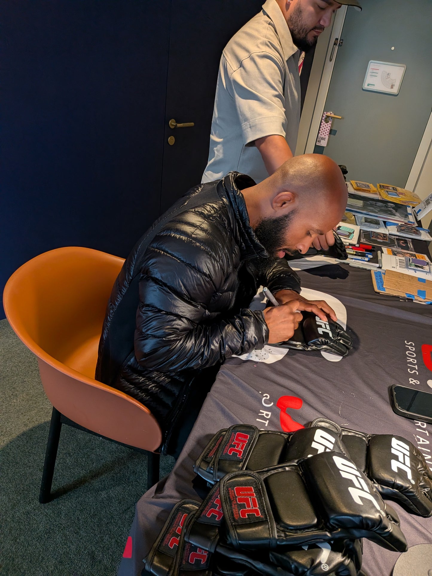 Demetrious Johnson Signed Glove - Gold Ink